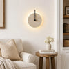 wabi sabi travertine disc wall sconce matte black