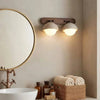 wabi sabi travertine walnut globe wall sconce