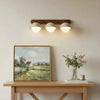 wabi sabi travertine walnut globe wall sconce