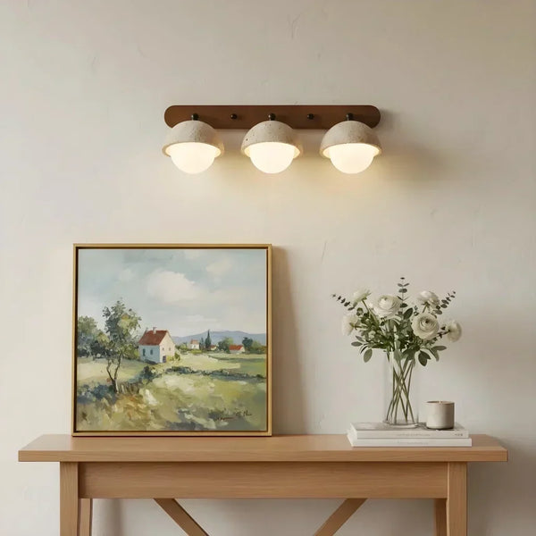 wabi sabi travertine walnut globe wall sconce