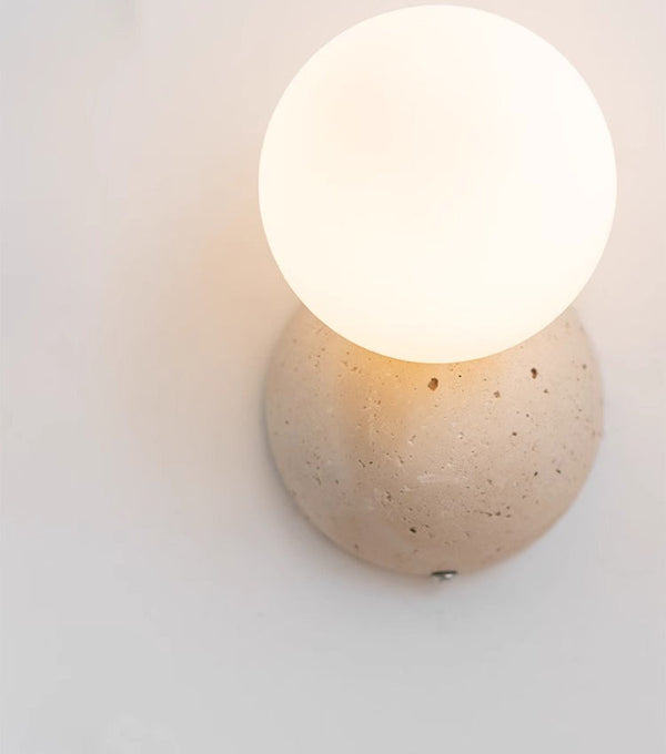 wabi sabi yellow travertine glass globe wall lamp