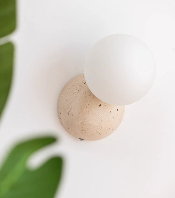 wabi sabi yellow travertine glass globe wall lamp