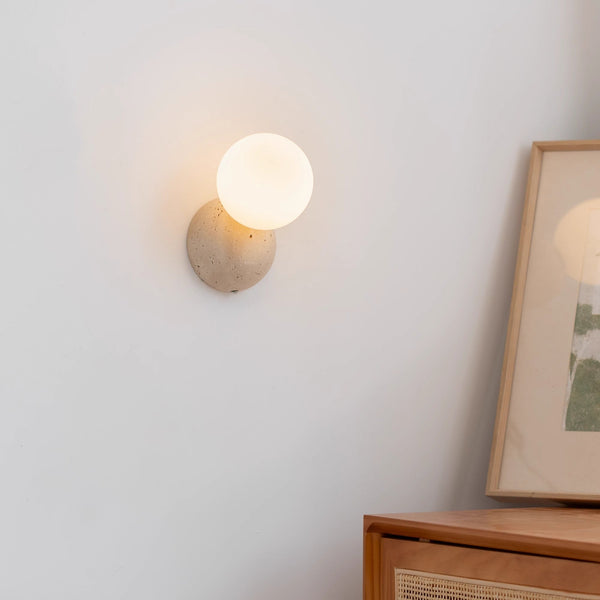 wabi sabi yellow travertine glass globe wall lamp