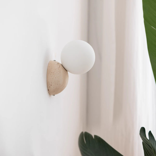 wabi sabi yellow travertine glass globe wall lamp