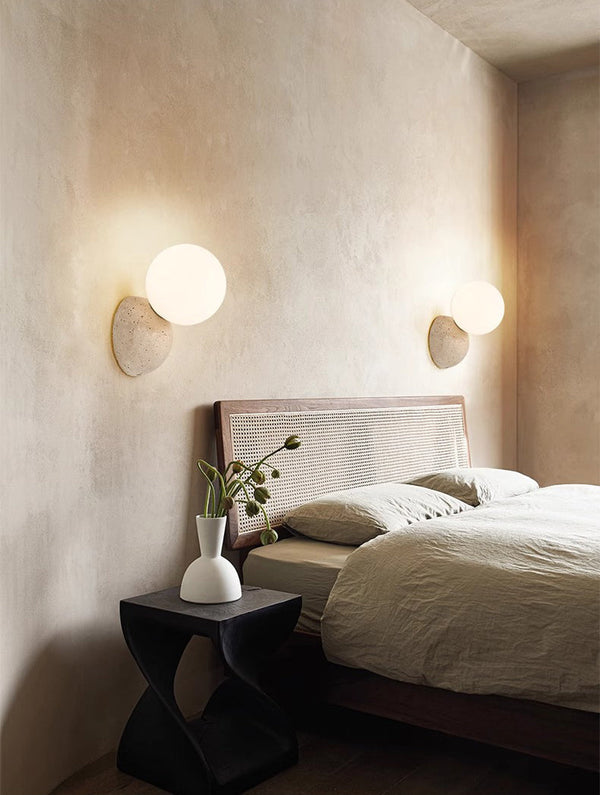 wabi sabi yellow travertine glass globe wall lamp