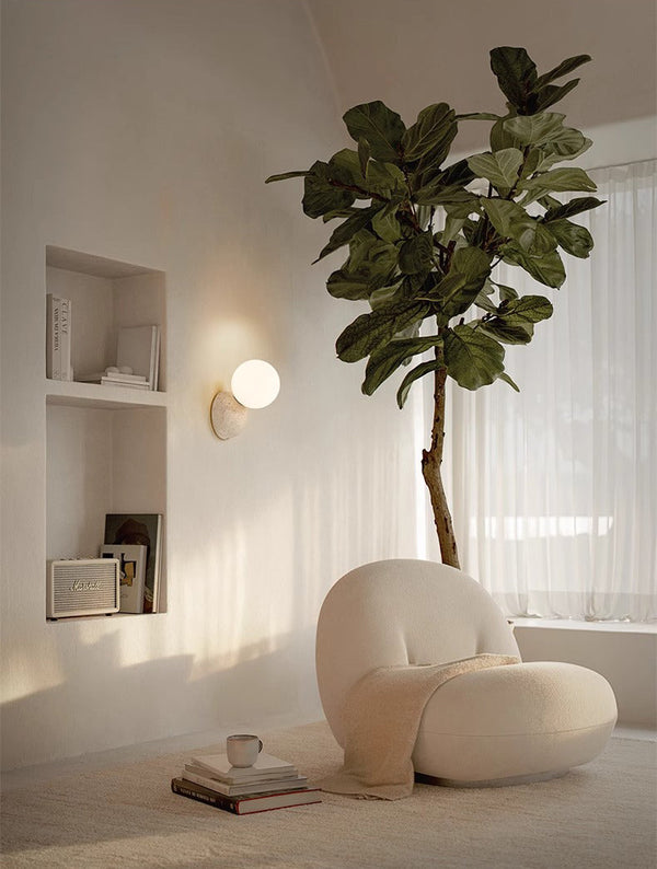 wabi sabi yellow travertine glass globe wall lamp