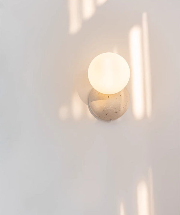 wabi sabi yellow travertine glass globe wall lamp