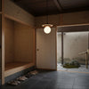 white travertine disk pendant light