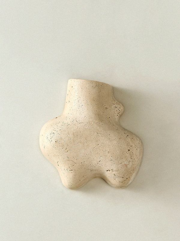yellow travertine abstract wall sconce