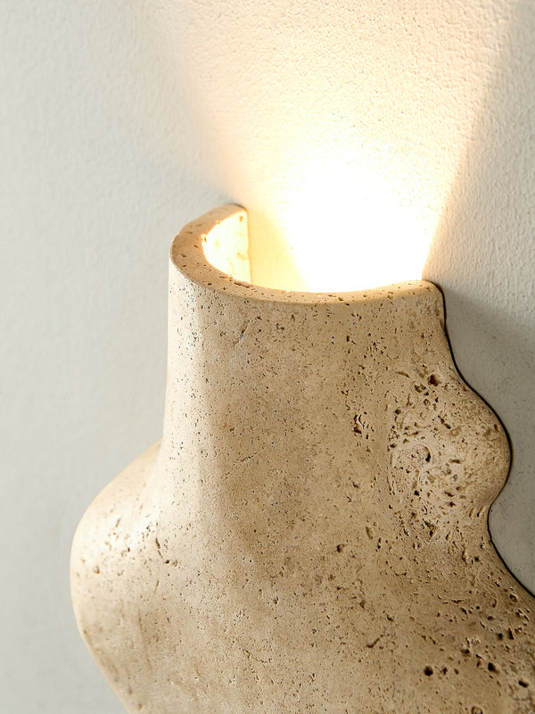 yellow travertine abstract wall sconce