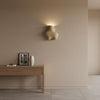 yellow travertine abstract wall sconce