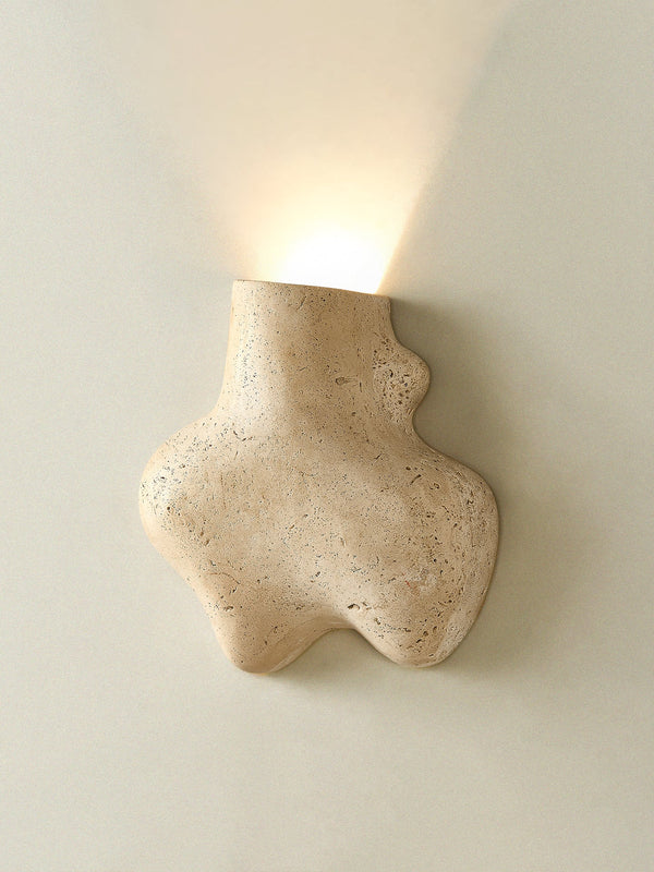 yellow travertine abstract wall sconce