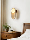 yellow travertine arch glass globe wall sconce