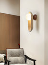 yellow travertine arch glass globe wall sconce