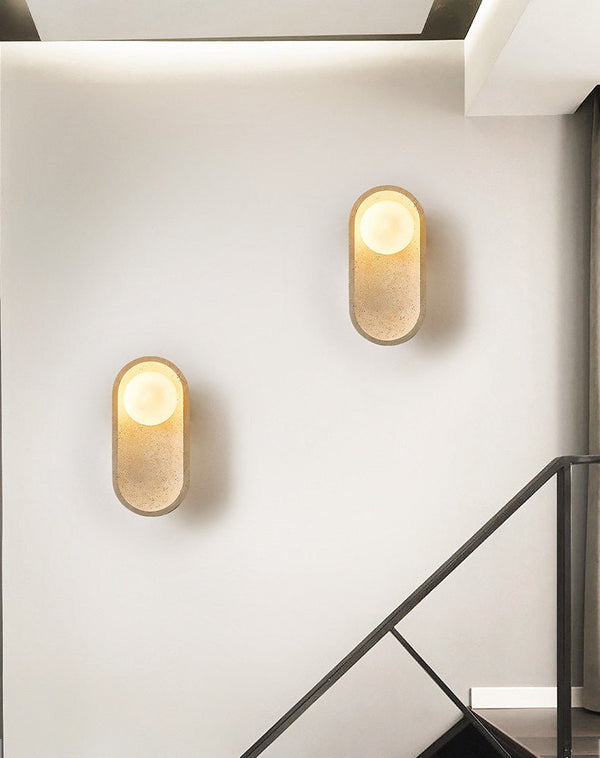 yellow travertine arch glass globe wall sconce