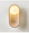 yellow travertine arch glass globe wall sconce