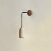 yellow travertine arched wall sconce walnut