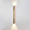 yellow travertine column wall sconce with dark walnut wood