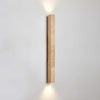 yellow travertine column wall sconce with dark walnut wood