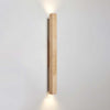 yellow travertine column wall sconce with dark walnut wood
