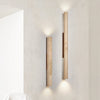 yellow travertine column wall sconce with dark walnut wood