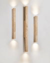 yellow travertine column wall sconce with dark walnut wood