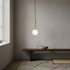 yellow travertine cube globe pendant light