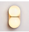yellow travertine double globe wall sconce