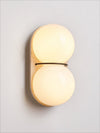 yellow travertine double globe wall sconce