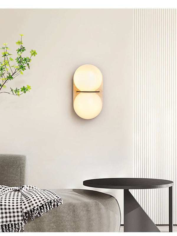 yellow travertine double globe wall sconce