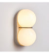 yellow travertine double globe wall sconce