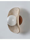 yellow travertine frosted glass globe wall sconce
