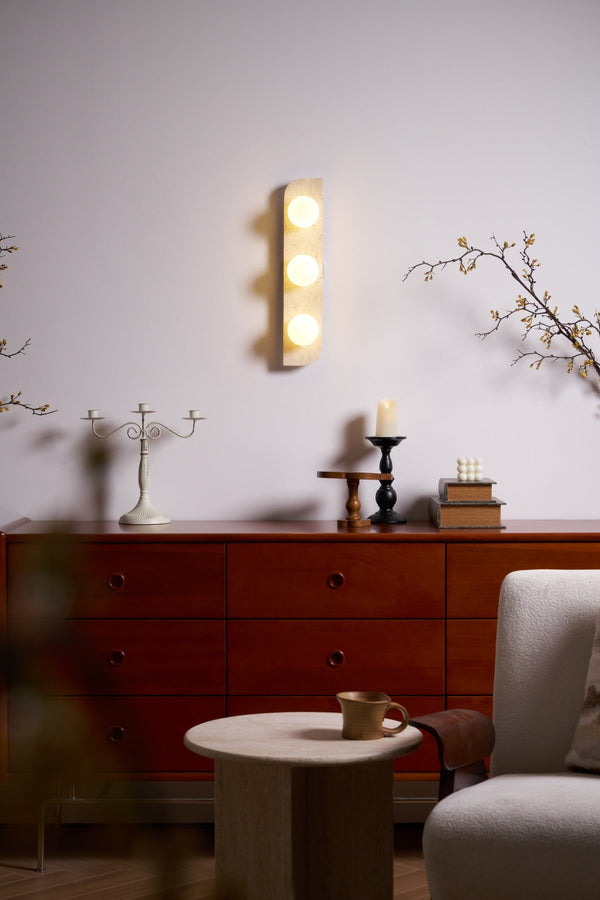 yellow travertine glass globe plug in wall sconce