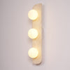 yellow travertine glass globe plug in wall sconce