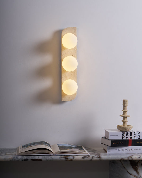 yellow travertine glass globe plug in wall sconce