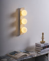 yellow travertine glass globe plug in wall sconce