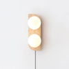 yellow travertine glass globe plug in wall sconce