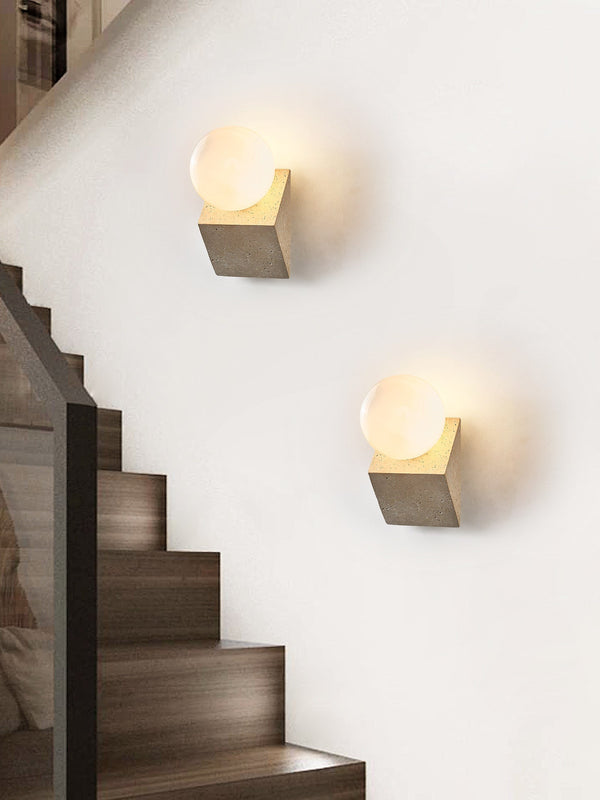 yellow travertine opal glass orb wall sconce