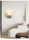 yellow travertine opal glass orb wall sconce