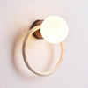 yellow travertine opaline glass globe wall sconce