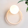 yellow travertine opaline glass globe wall sconce