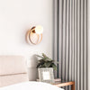 yellow travertine opaline glass globe wall sconce